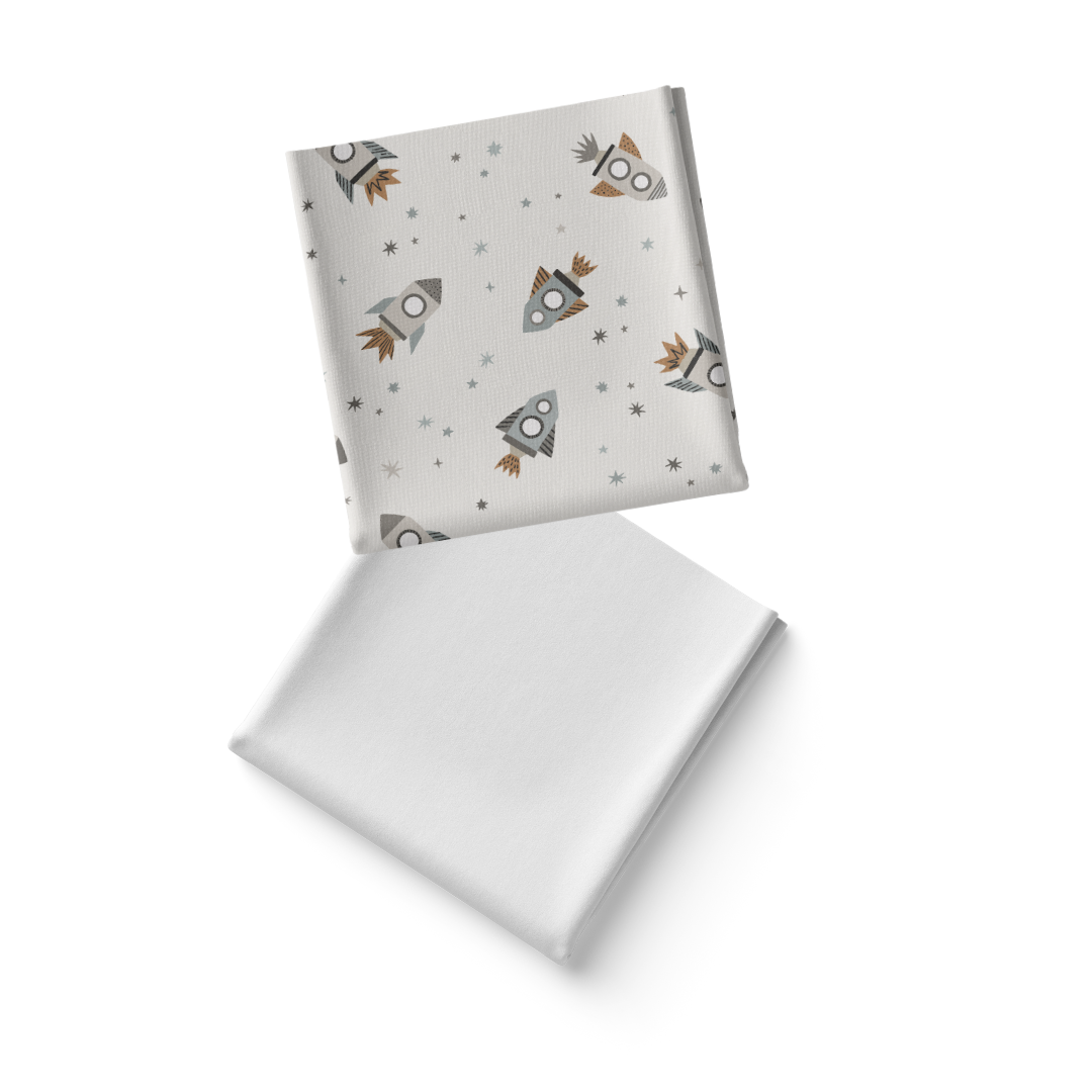 Pack de 2 Sábanas Bajeras Cuna - Viaje Estelar & Blanca