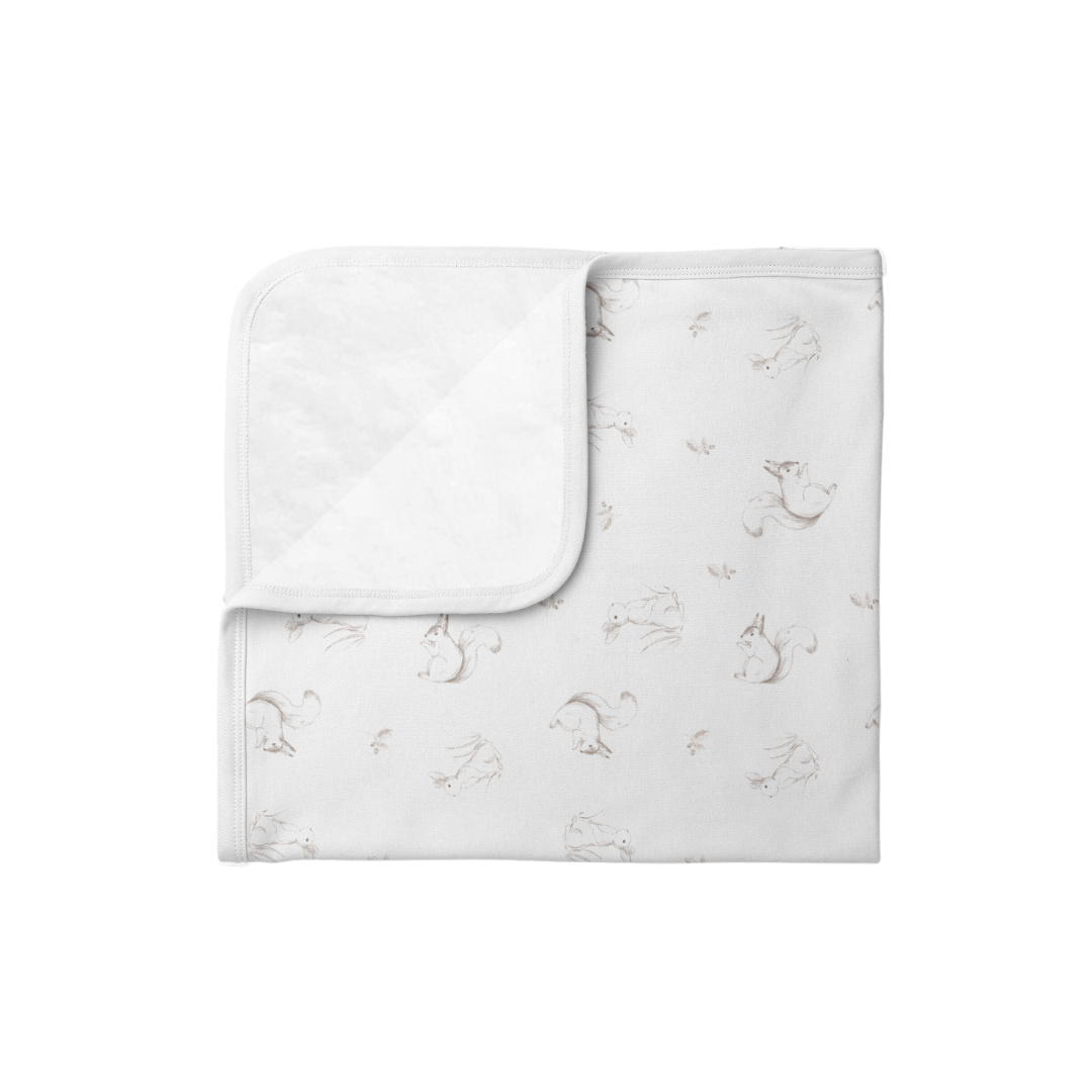 Manta Pima con Plush Ardilla y Conejito